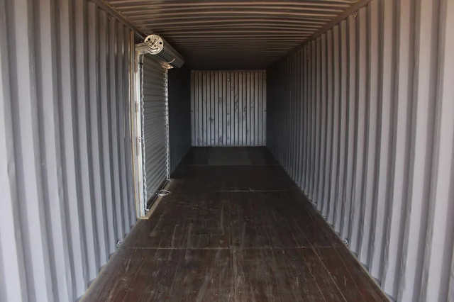 Side view of a 40-foot container highlighting its corrugated wall panels