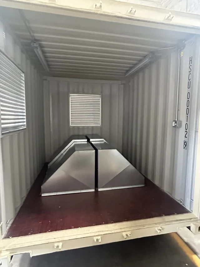 Generator housing modification showing fuel line and electrical access