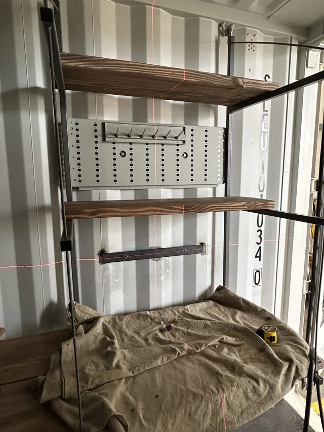 Custom partition wall installation in a Gunfighter container project