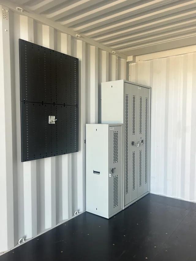 Detail of custom door hardware on a Gunfighter container build