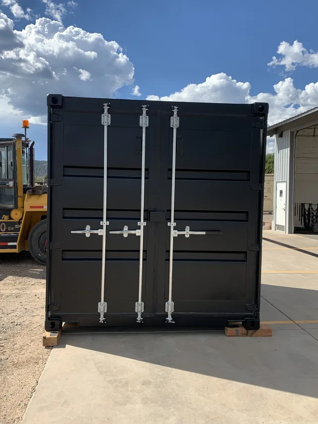 Container modification showing exhaust fan and intake vent placement