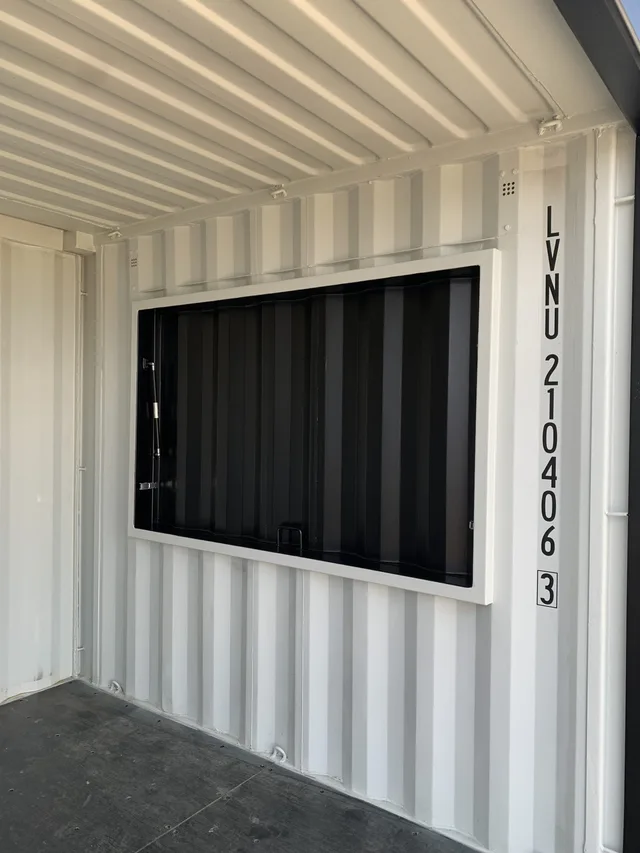 Container conversion with custom cabinetry and countertop installation