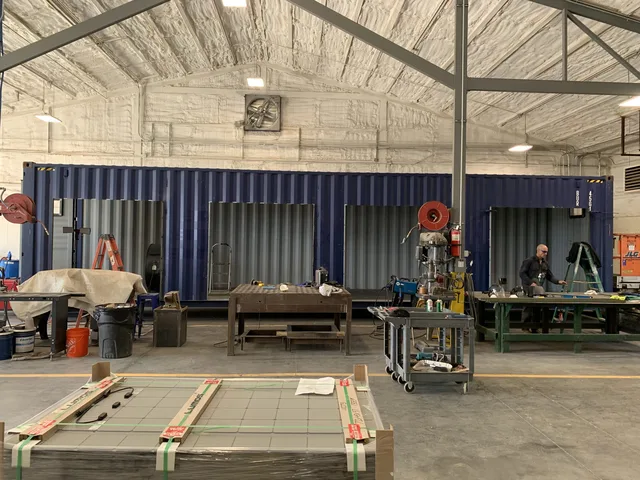 Custom container with built-in workbench and tool storage