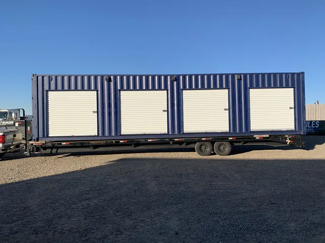 Container conversion with finished bathroom and plumbing connections