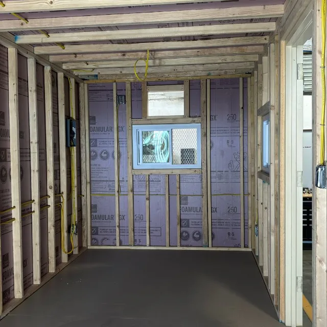 Standard container showing corrugated walls and cargo door hardware
