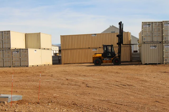 Multi-container configuration for a modular office complex project