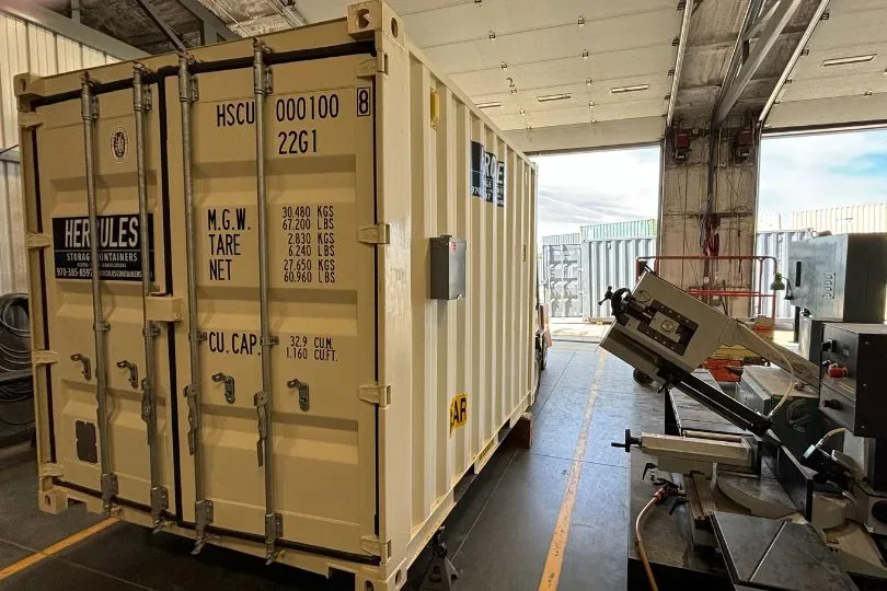 Container side view showing heavy-gauge corrugated steel construction