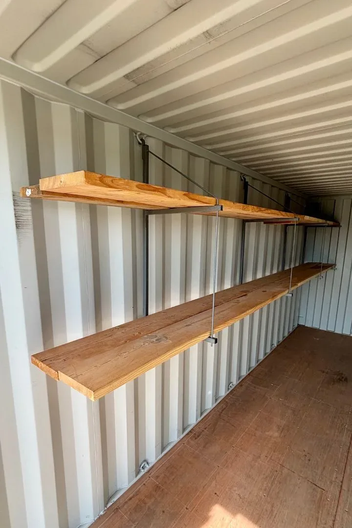 Heavy-duty container shelving rack installed inside a storage container